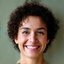 Professional headshot of Dr. Elena Garcia, a licensed Naturopathic Doctor