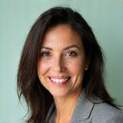 Portrait of Dr. Maria Rodriguez, a warm and professional woman with a knowledgeable demeanor.